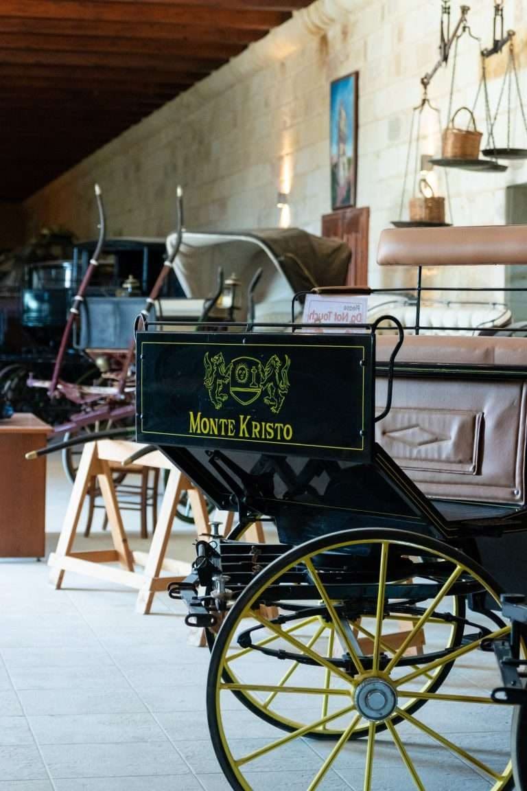 A vintage horse-drawn carriage in the Montekristo museum