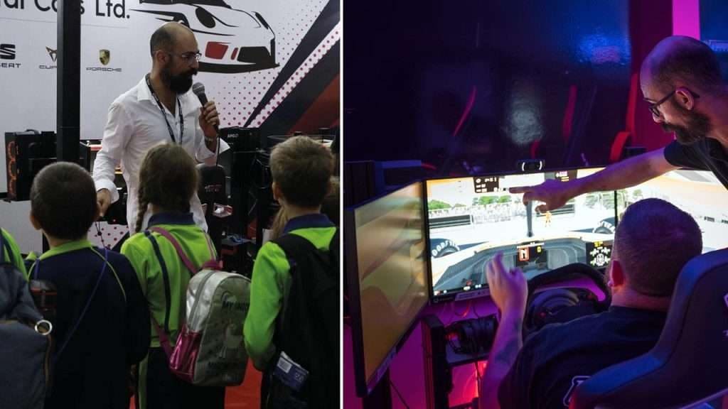 Children watching a presenter and a person using a racing simulator at World Pro Racing