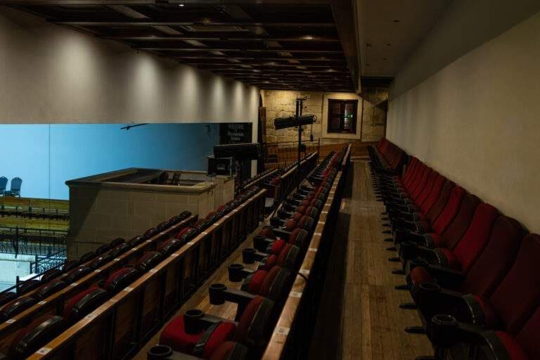 Raked red seating inside The Internal Arena