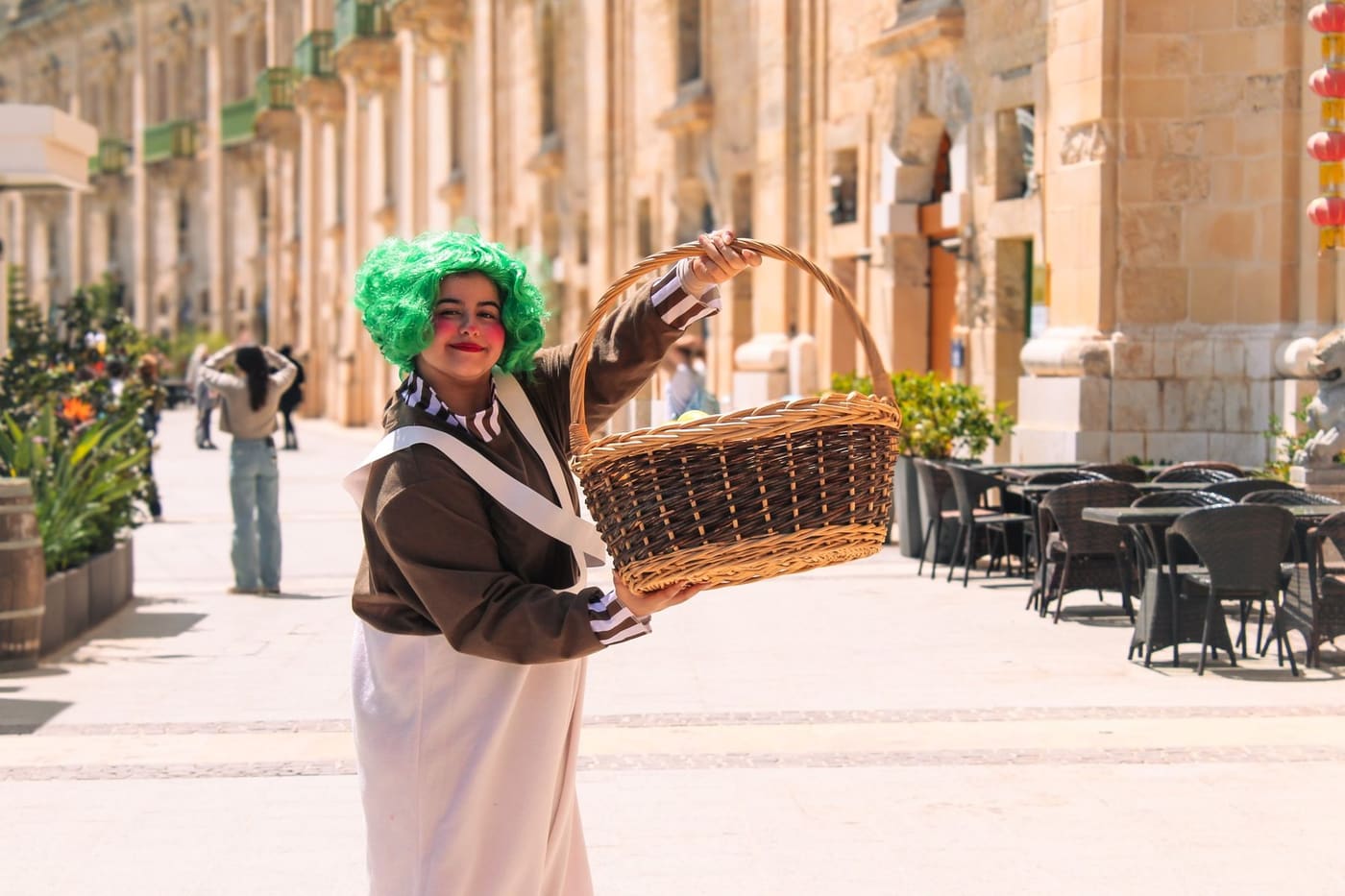 A costumed character carrying a basket at the Easter egg hunt
